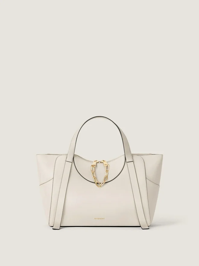Medium the Snatch Bag in Grained Leather Medium the Snatch Bag in Grained Leather