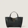 Medium the Snatch Bag in Grained Leather Medium the Snatch Bag in Grained Leather