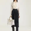 Medium the Snatch Bag in Grained Leather Medium the Snatch Bag in Grained Leather
