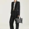 Medium the Snatch Bag in Grained Leather Medium the Snatch Bag in Grained Leather