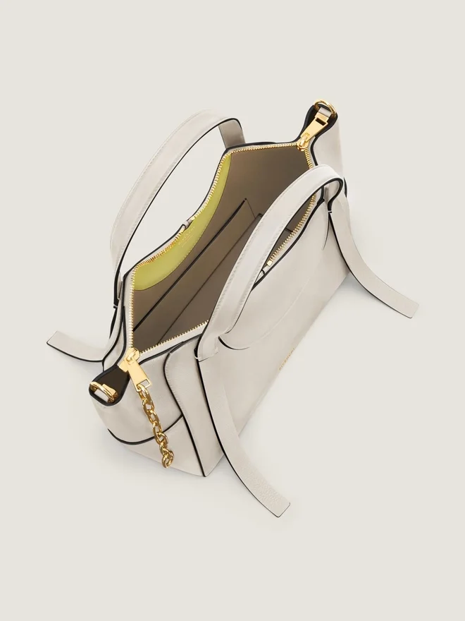 Medium the Snatch Bag in Grained Leather Medium the Snatch Bag in Grained Leather