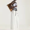 Medium Voyou Bag in Suede and Leather
